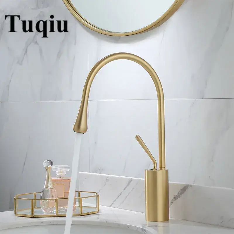 Modern brushed gold basin faucet with sleek curved swivel spout and cylindrical base by decorbites for bathroom use