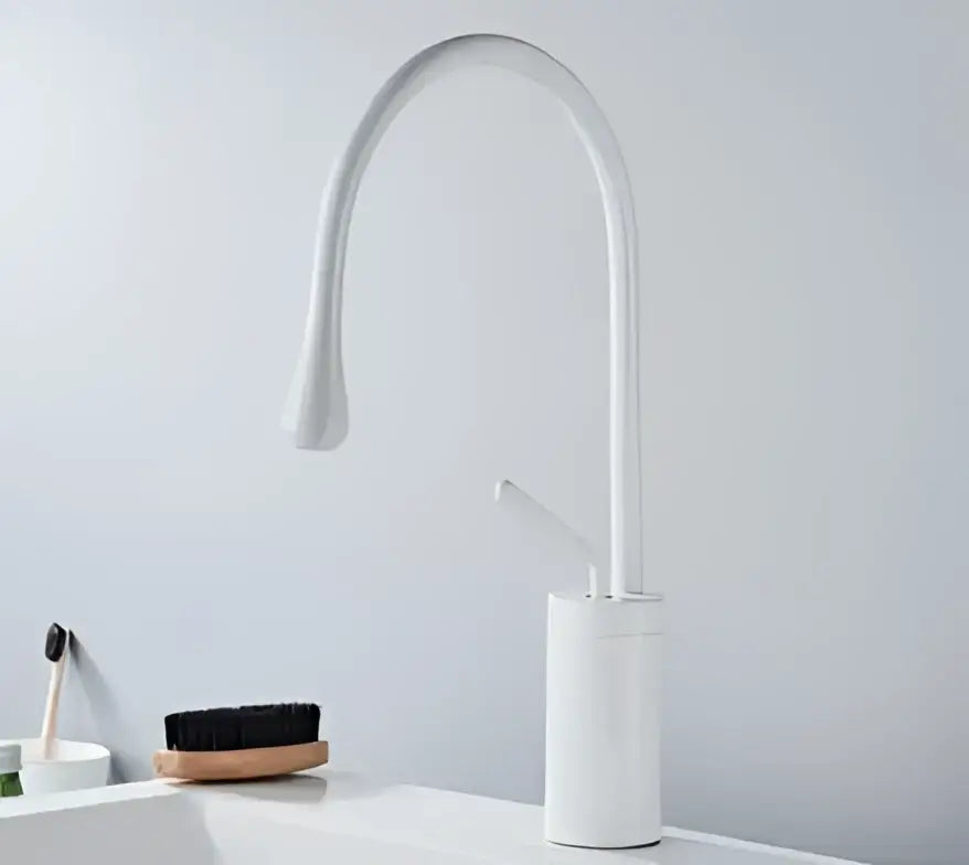 Modern brushed gold basin faucet with a sleek curved swivel spout and cylindrical base by decorbites brushed gold
