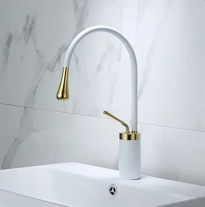 Modern brushed gold basin faucet with white and gold curved swivel spout and cylindrical base for bathroom decorbites