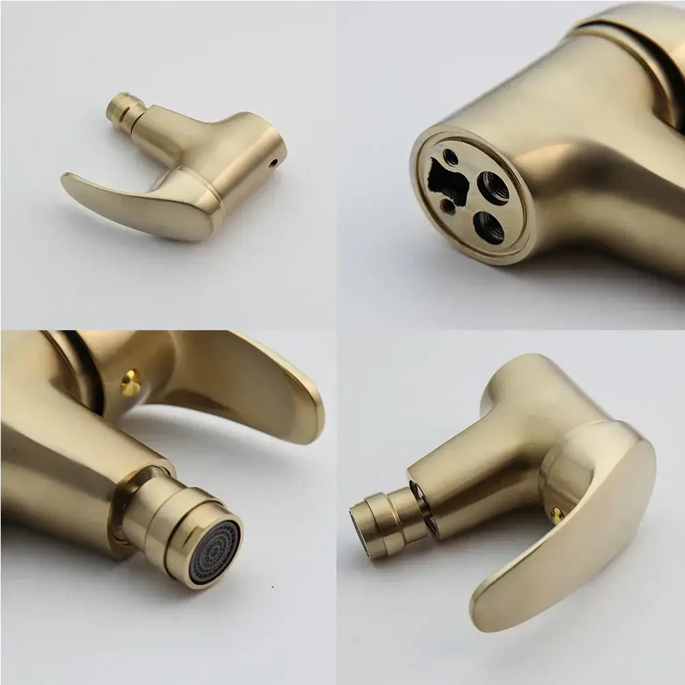 Modern brushed gold basin mixer tap with single-handle design and integrated spray nozzle in metallic finish