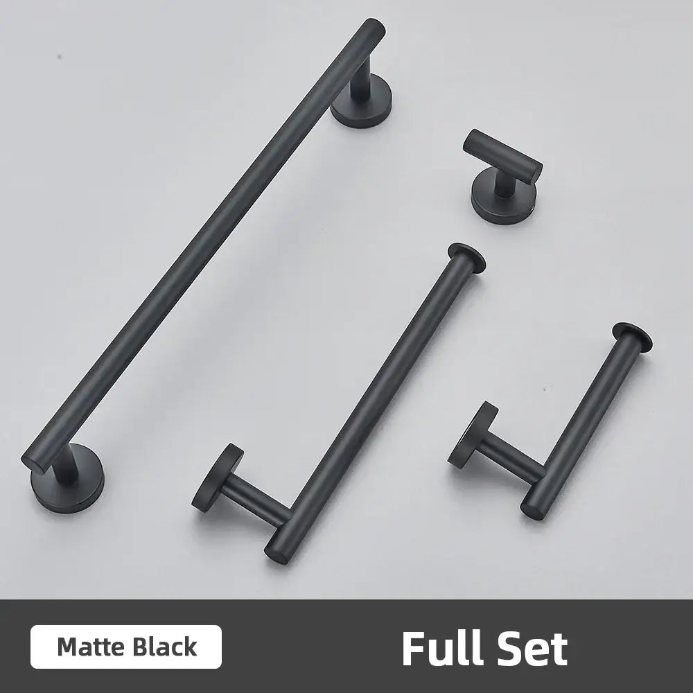 Matte black bathroom accessories set featuring modern towel bars and matching knobs in brushed gold stainless steel