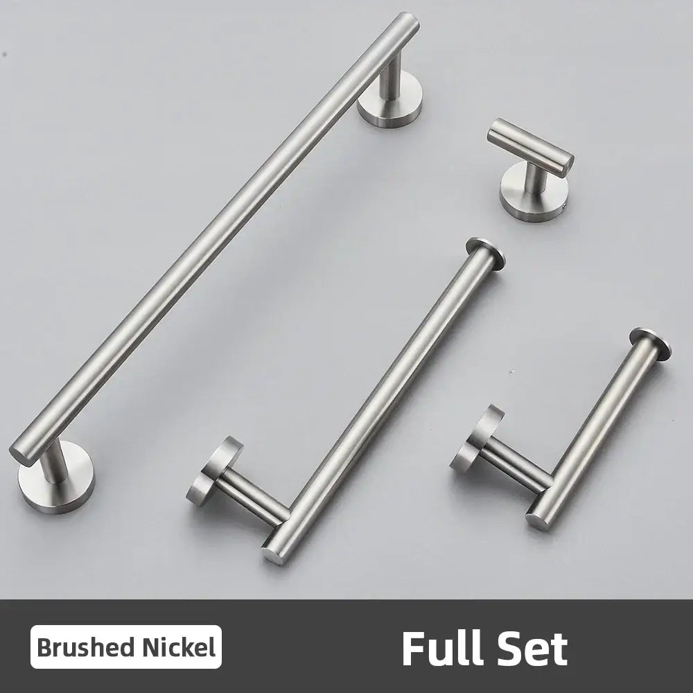 Set of modern brushed gold bathroom accessories set in stainless steel featuring sleek bar and t-bar handles