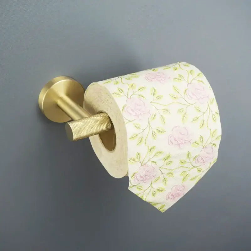 Modern brushed gold toilet paper holder with floral tissue roll from decorbites brushed gold bathroom accessories set