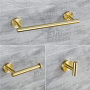 Modern brushed gold bathroom towel rack with sleek metal design and circular wall mounts from decorbites brushed gold set