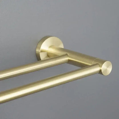 Modern brushed gold double-bar towel rack with sleek brushed metal finish and circular end caps bathroom hardware set