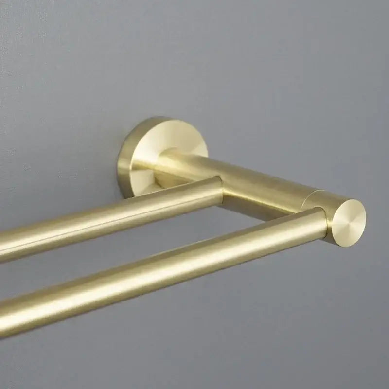 Modern brushed gold double-bar towel rack with sleek brushed metal finish and circular end caps bathroom hardware set