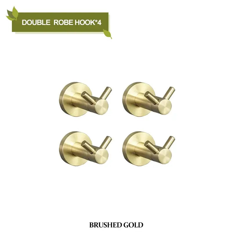 Set of four brushed gold double robe hooks from a modern brushed gold bathroom hardware set for bathroom hardware use