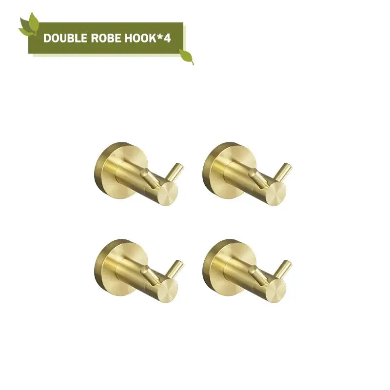 Set of four brushed gold double robe hooks with a sleek modern design in decorbites brushed gold bathroom hardware set