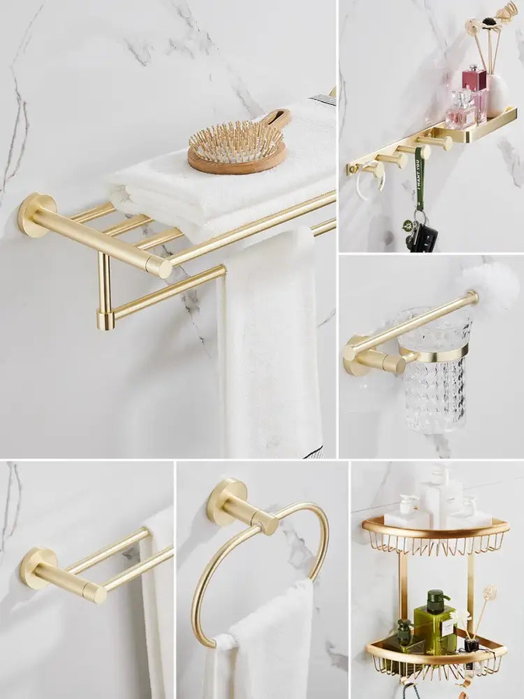 Modern brushed gold bathroom hardware set with multi bar towel rack key holder and two tier shelf in sleek design