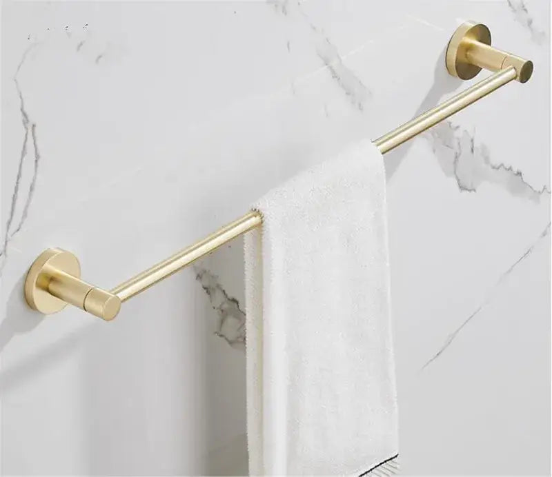 Modern brushed gold bathroom hardware set featuring a gold-toned double towel rack with a sleek brushed metal finish