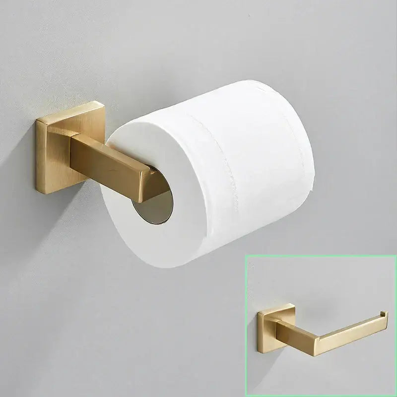 Gold-toned wall-mounted toilet paper holder with a sleek modern design from decorbites brushed gold hardware set