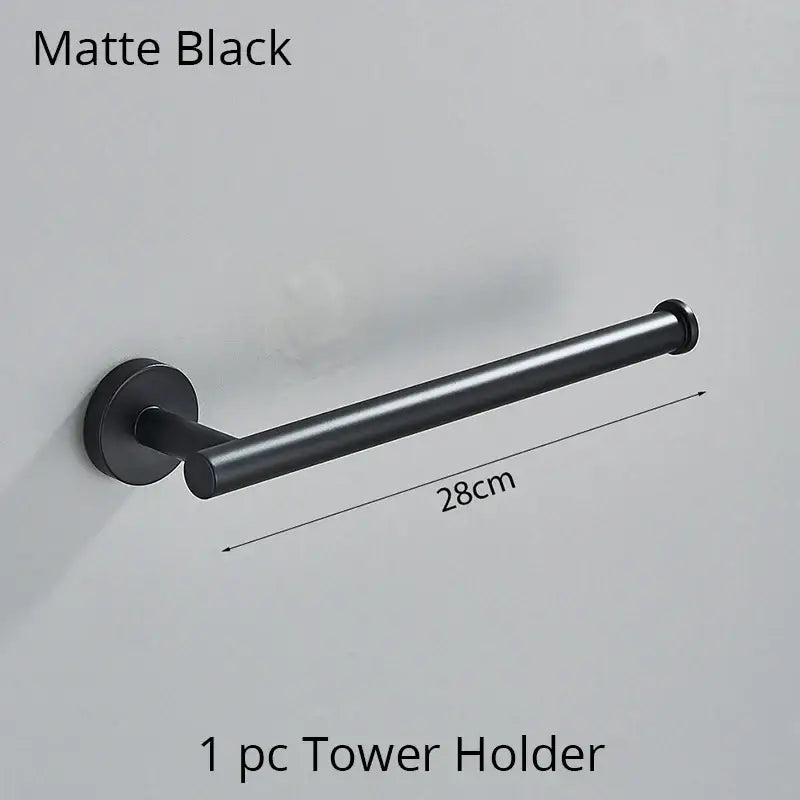 Modern brushed gold bathroom hardware set featuring a matte black metal tower holder with a sleek cylindrical design decorbites bathroom hardware