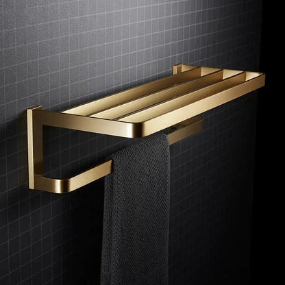 Modern brushed gold bathroom hardware set featuring a gold-toned towel rack with sleek metallic finish and three bars