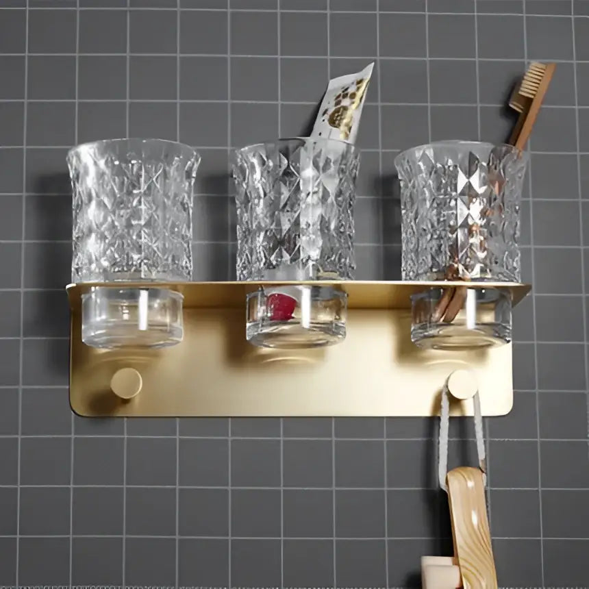 Modern brushed gold wall-mounted toothbrush holder with crystal-cut glass cups from decorbites brushed gold hardware set