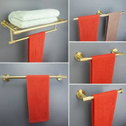 Modern brushed gold bathroom towel rack with sleek metal design and circular wall mounts for decorbites brushed gold set