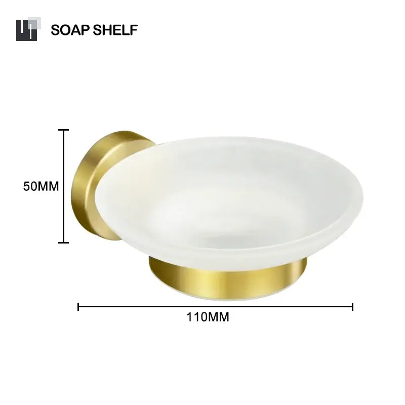Gold-finished metal wall-mounted soap dish with frosted white glass bowl in brushed gold bathroom decorbites set