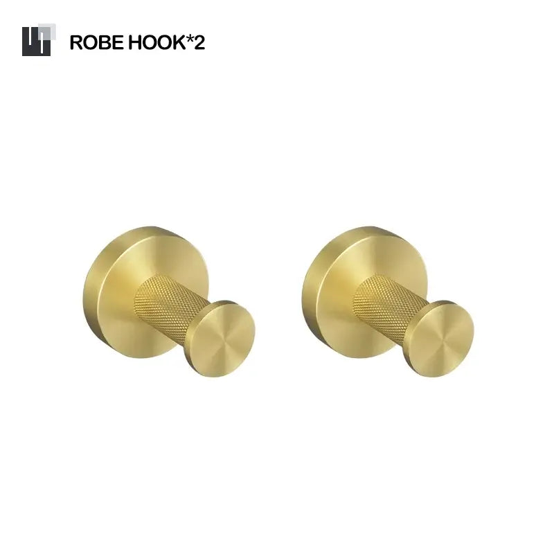 Two sleek gold-finished robe hooks with textured grip and circular plates in a decorbites brushed gold bathroom set