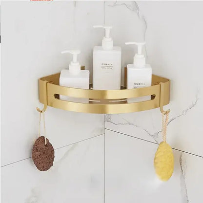 Modern brushed gold bathroom set metal corner shelf with two hooks holding bath sponges decorbites brushed gold