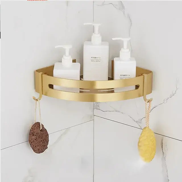 Modern brushed gold bathroom set metal corner shelf with two hooks holding bath sponges decorbites brushed gold