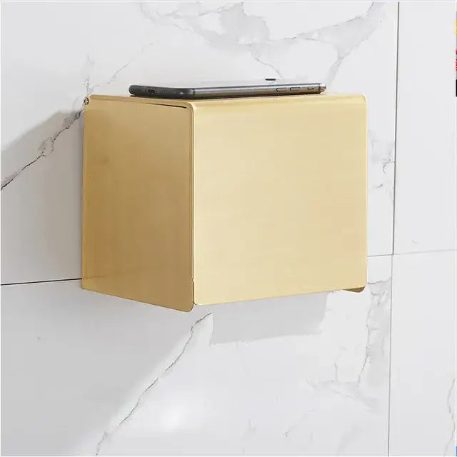 Gold-colored rectangular wall-mounted tissue box with brushed gold metallic finish in decorbites bathroom set
