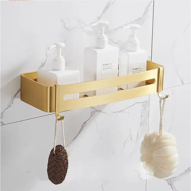 Modern brushed gold bathroom set wall-mounted metal shelf with two hooks holding bath accessories decorbites brushed gold
