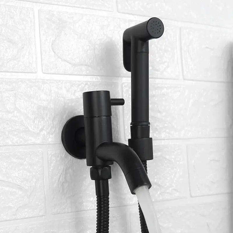 Black matte-finish wall-mounted bidet faucet set with flexible hose and nozzle for modern bathroom use