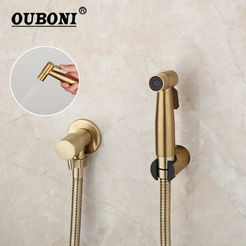 Modern brushed gold bidet faucet featuring a gold-finished Ouboni handheld shower nozzle with flexible braided hose by Decorbites brushed gold