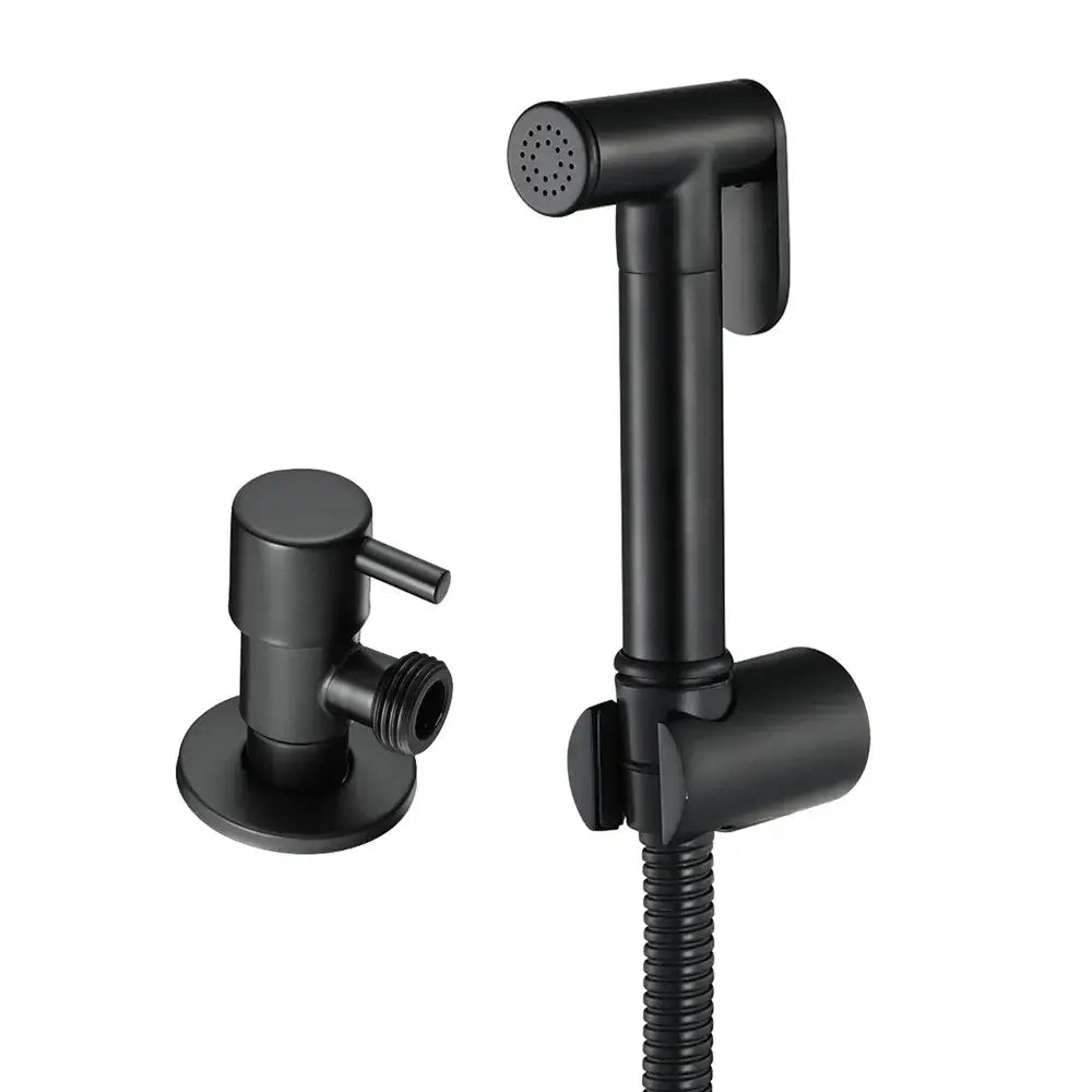 Black matte bidet sprayer kit with flexible hose and wall-mounted valve complementing brushed gold bidet sprayer set
