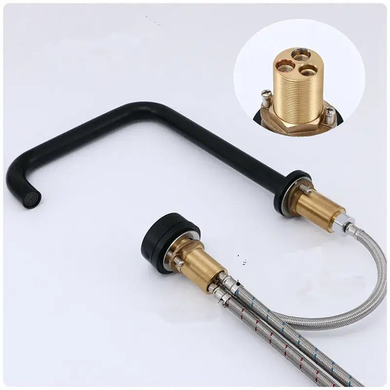 Modern brushed gold and black basin faucet with black curved spout and brass fittings by decorbites brushed gold