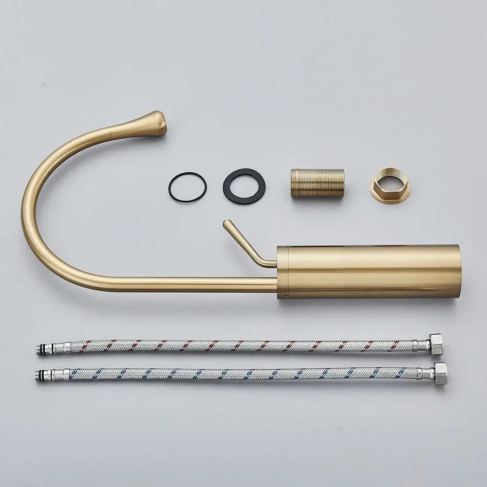 Modern brushed gold and black deck mounted single hole basin tap with brass waterfall spout and installation hardware
