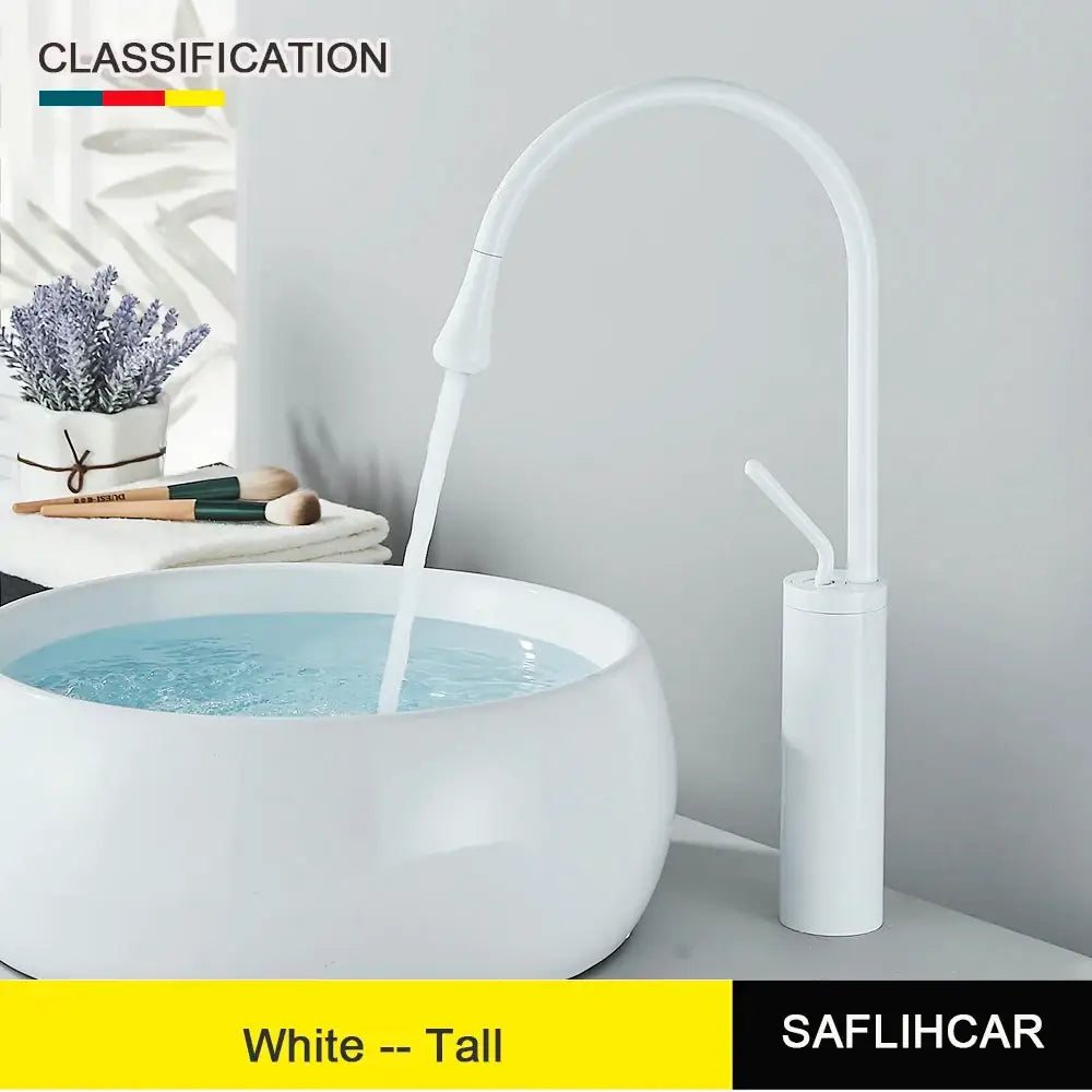 Modern brushed gold and black deck mounted basin tap kitchen faucet with a white single hole tall curved spout