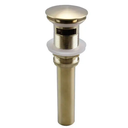 Brass-finished bathroom sink drain with sleek cylindrical body and threaded connections for decorbites brushed gold black mixer