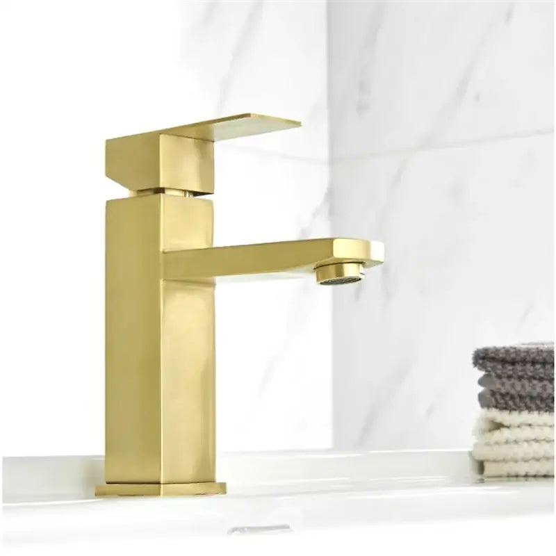 Modern brushed gold black rectangular basin tap with sleek geometric design and brushed metal finish by decorbites