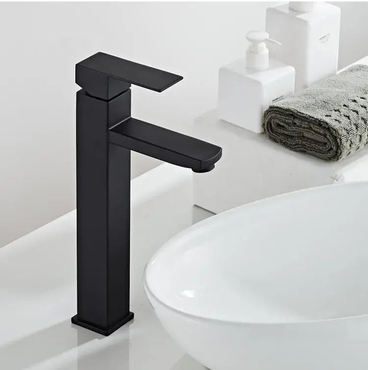 Modern brushed gold black rectangular basin tap featuring a black matte-finish sleek modern faucet for bathroom use