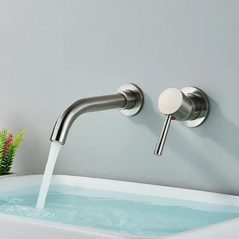 Modern brushed gold wall mounted basin faucet with sleek curved spout and cylindrical handle for bathroom use