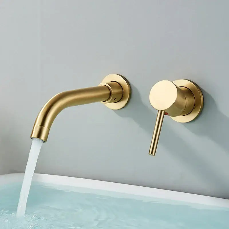 Modern brushed gold wall mounted basin faucet with sleek curved spout and minimalist cylindrical handle for bathroom mixer