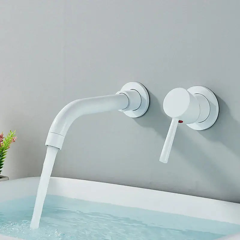Modern white wall mounted basin faucet with sleek curved spout and minimalist handle in brushed gold and black finish