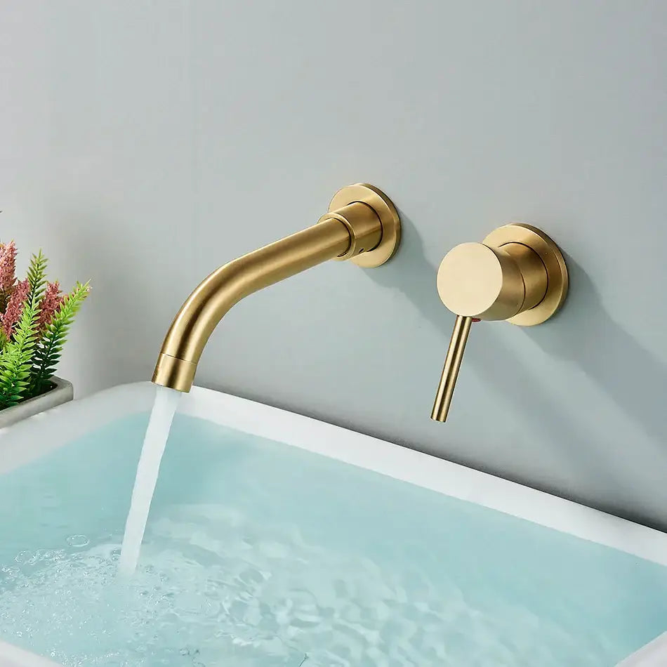 Modern brushed gold wall mounted basin faucet with sleek design and matching cylindrical handle for bathroom mixer