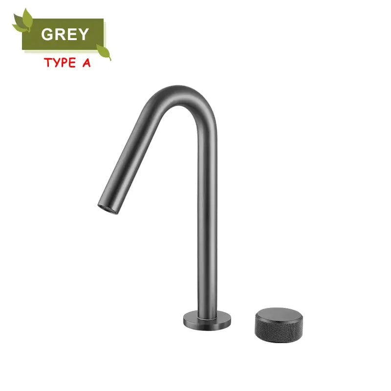 Matte grey modern basin faucet with curved spout and textured handle in brushed gold decorbites brass basin design