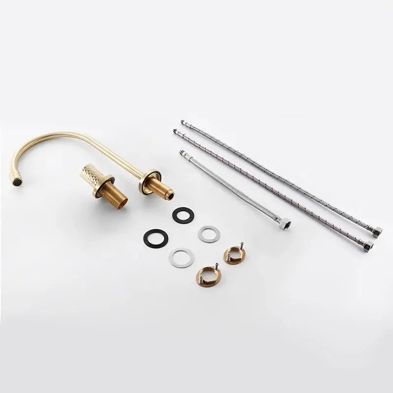 Modern brushed gold brass basin faucet with curved spout textured handle and flexible hoses for kitchen use decorbites brass basin