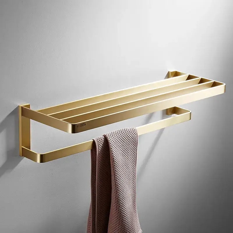 Modern brushed gold brass double-tiered towel rack with sleek metallic finish in bath hardware set for bathroom use