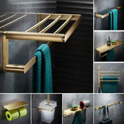 Modern brushed gold brass bath hardware set featuring a sleek towel rack with multiple horizontal bars for towels