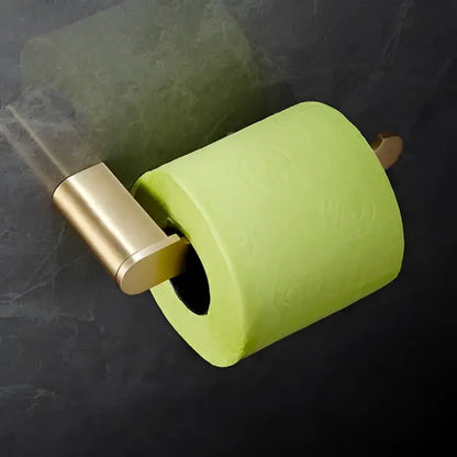 A vibrant lime green toilet paper roll on a modern brushed gold brass bath hardware set holder