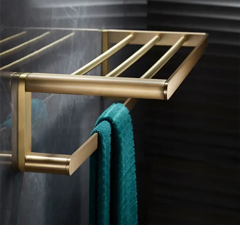 Modern brushed gold brass bath hardware set towel rack with gold-toned metal and sleek horizontal bars
