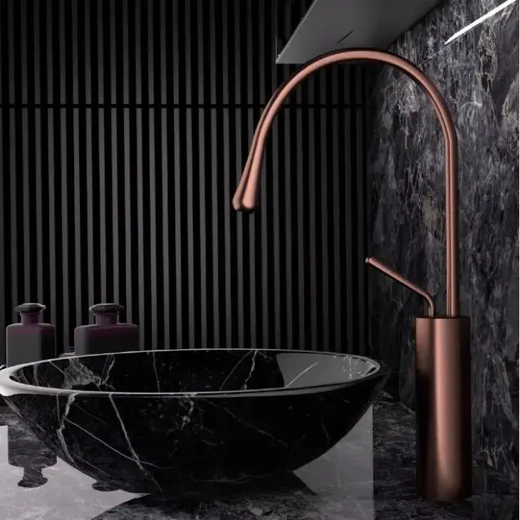 Modern brushed gold brass kitchen sink faucet with copper finish sleek curved spout and cylindrical base
