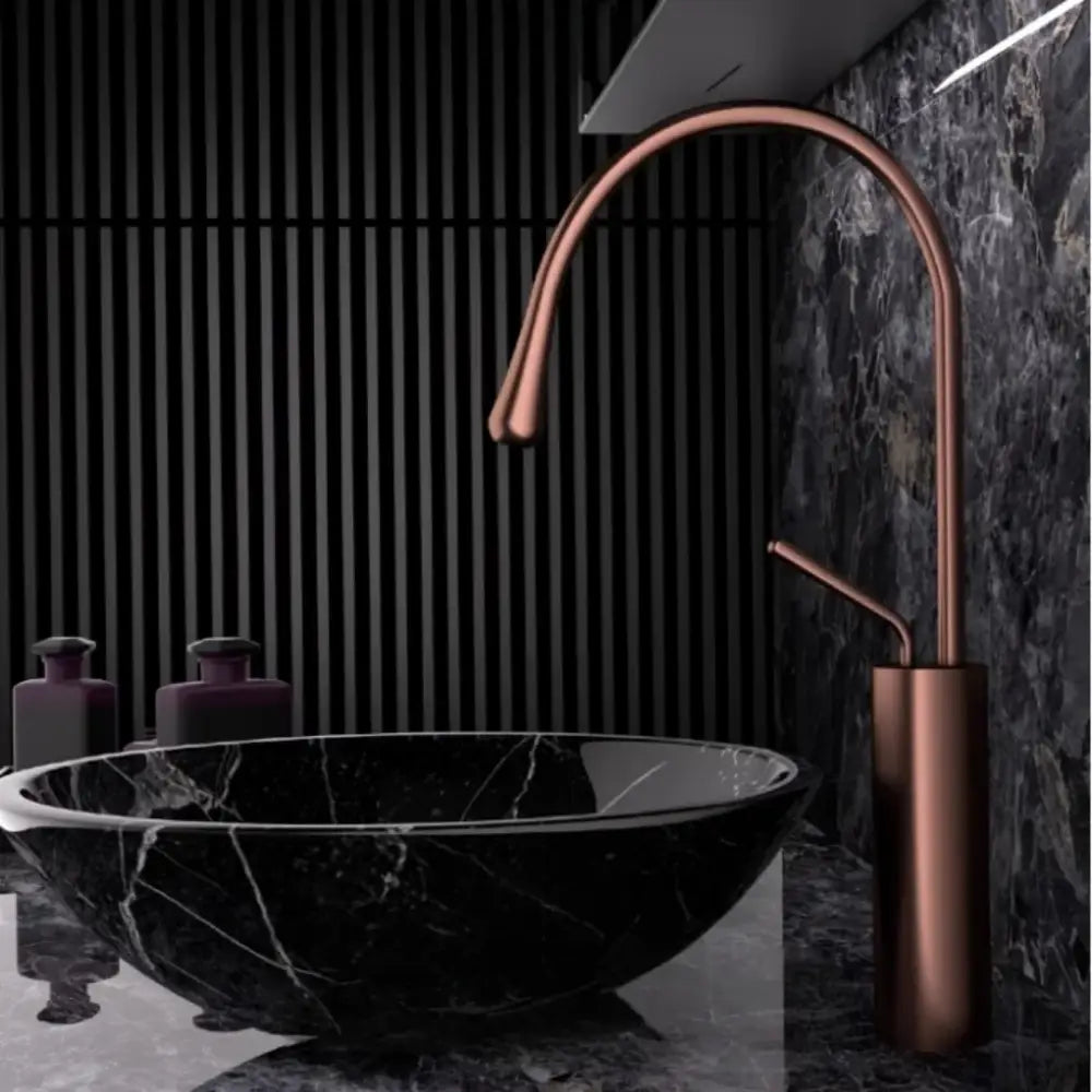 Modern brushed gold brass kitchen sink faucet with copper finish sleek curved spout and cylindrical base