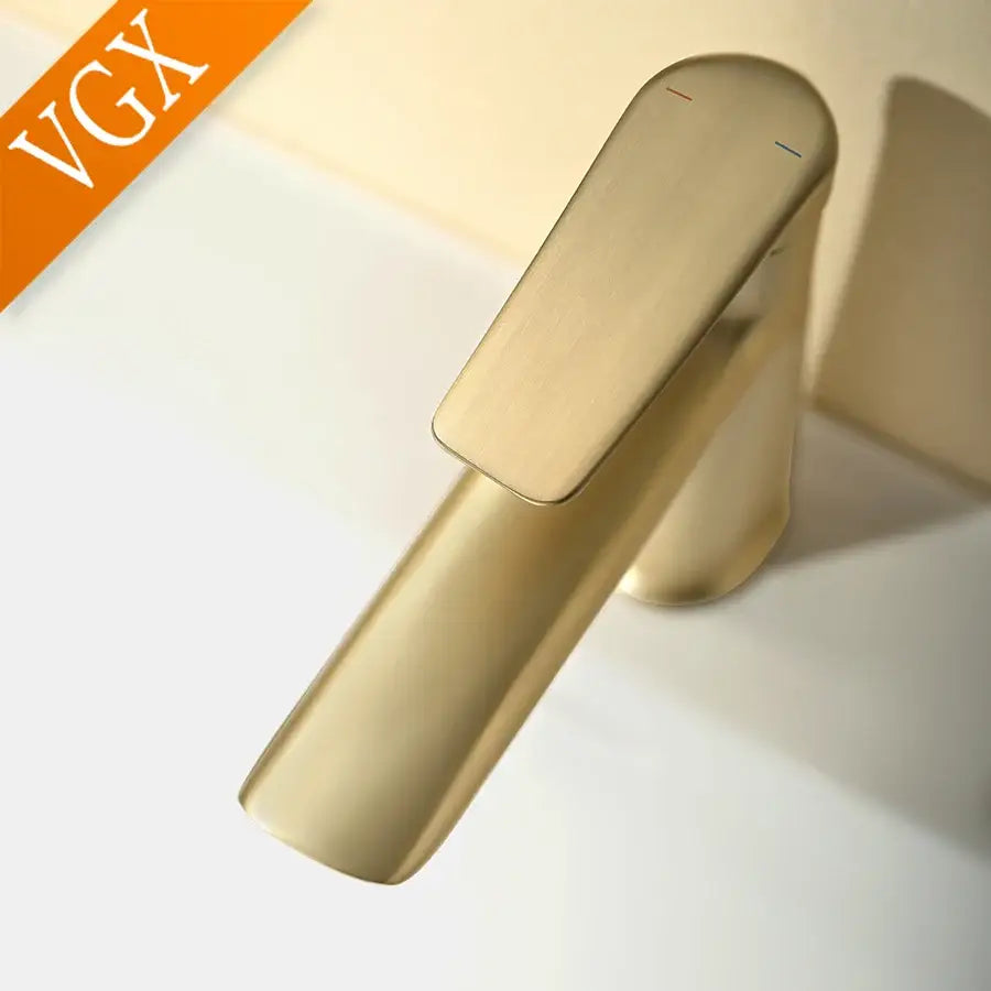 Modern brushed gold basin faucet with sleek centerset deck-mounted design suitable for cold water use