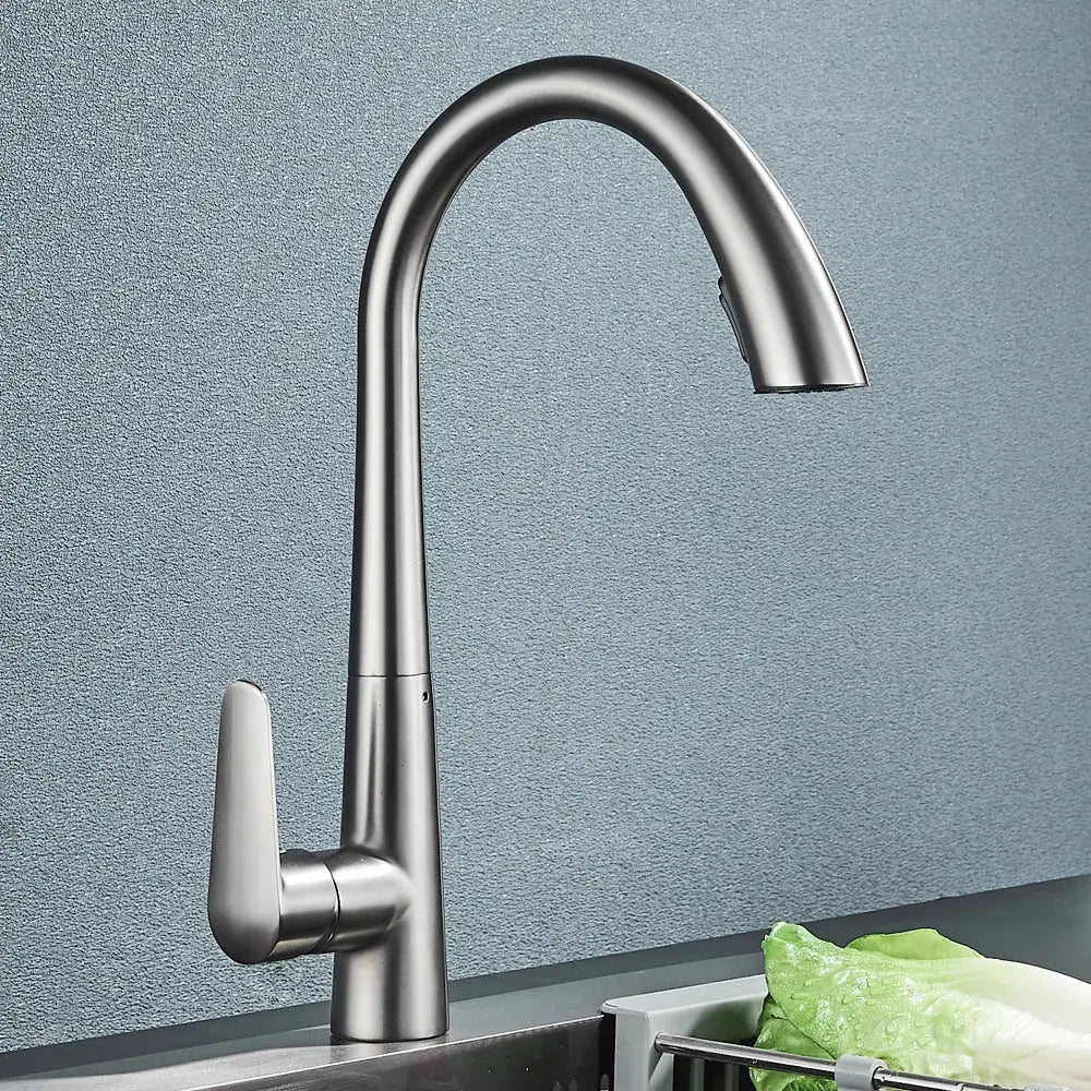 Modern brushed gold gourmet kitchen faucet with sleek curved spout and minimalist handle by decorbites brushed gold