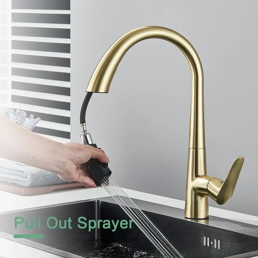 Modern brushed gold gourmet kitchen faucet with sleek curved spout and black flexible pull out spray head decorbites brushed gold