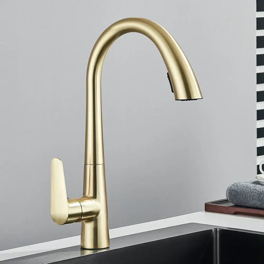 Modern brushed gold gourmet kitchen faucet with sleek curved spout and minimalist handle decorbites brushed gold